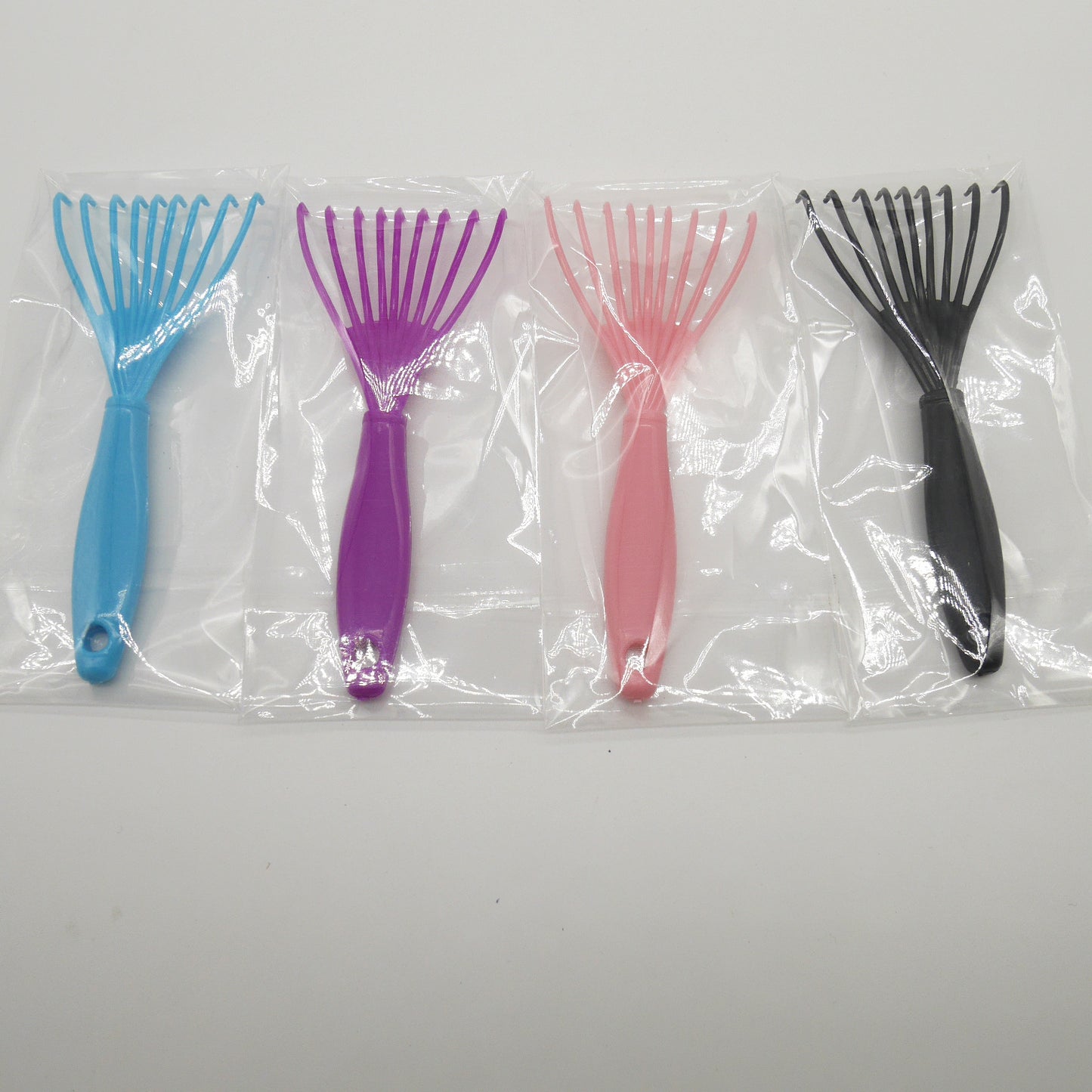 Nettoyant pour plastique Nettoyage Râteau à gratter Brosses à cheveux et peignes