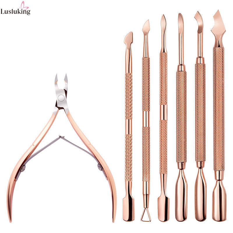 Ensemble d'outils pour repousser les ongles à double tête et pince à cuticules dorée