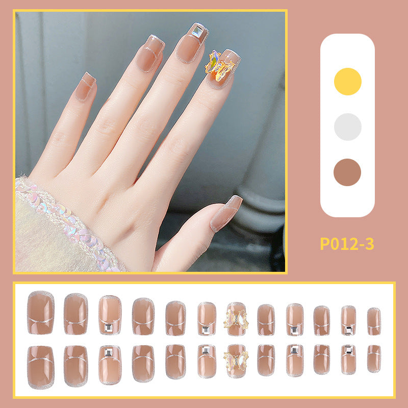 Porter une armure avec un gros nœud papillon en diamant French Cute Nail Art