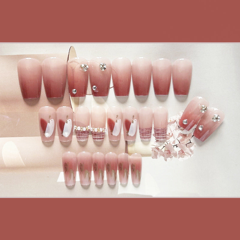 Faux ongles faits main avec dégradé de blush Wear Armor