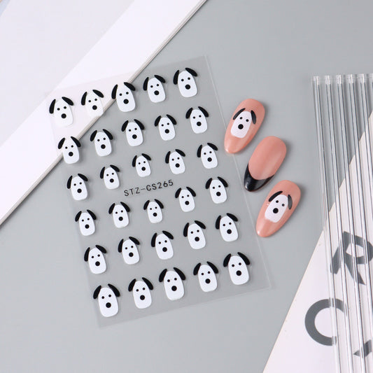 Autocollants pour ongles en forme de chiot de dessin animé noir et blanc