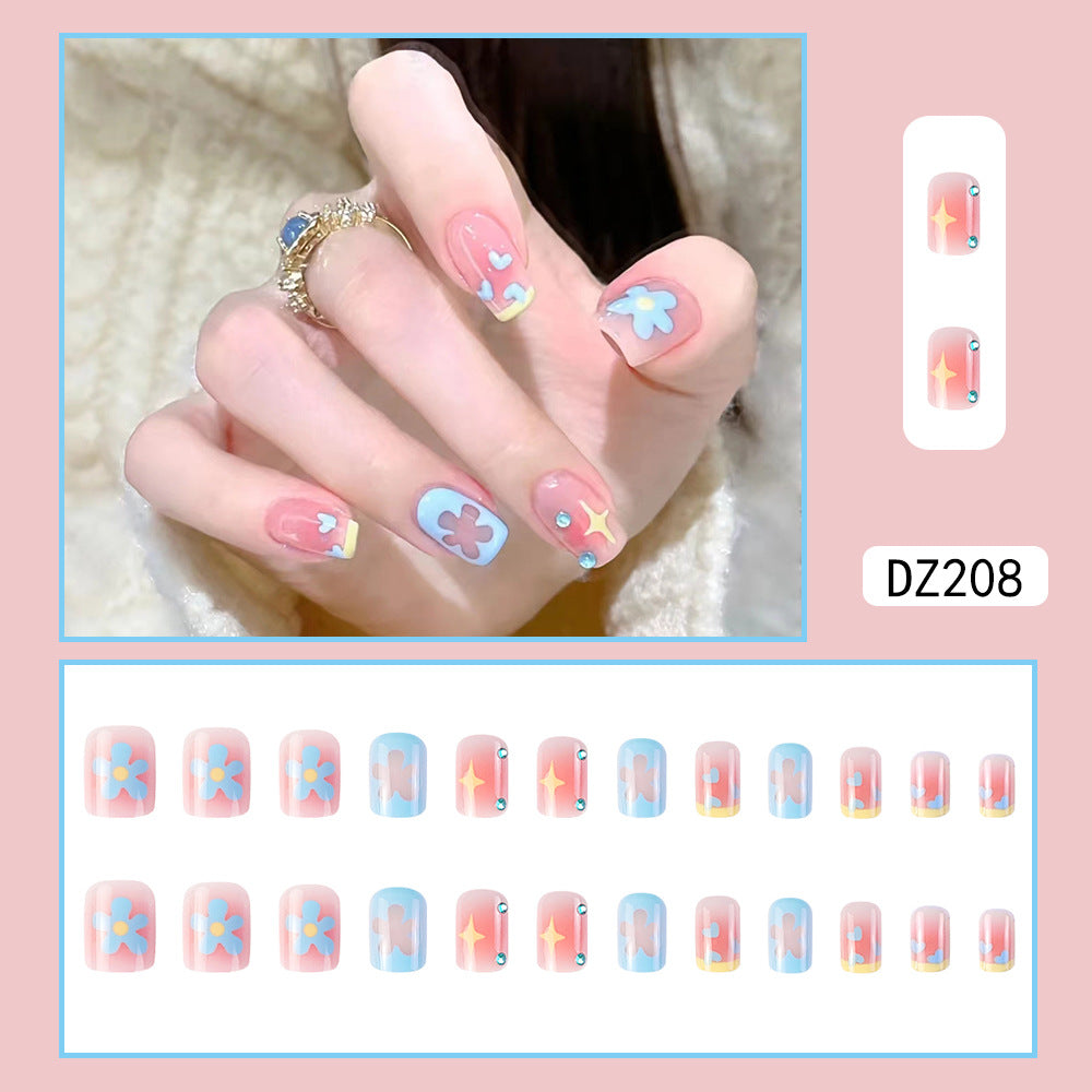 Nail Art avec patch de fleurs étoilées mi-longues