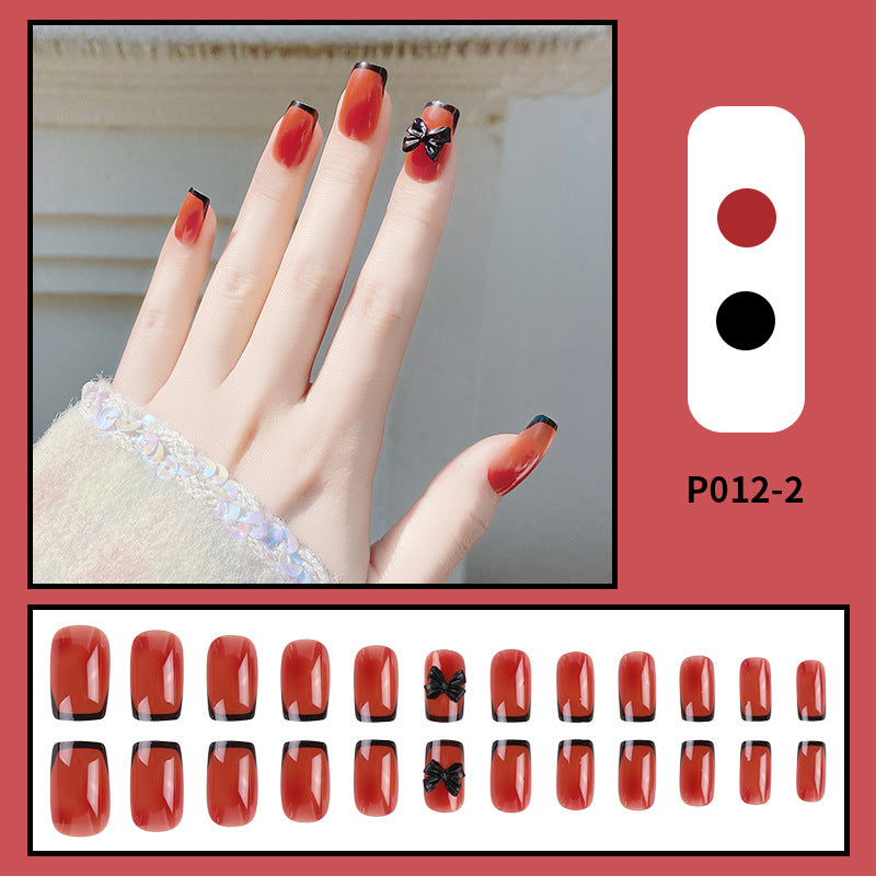 Porter une armure avec un gros nœud papillon en diamant French Cute Nail Art