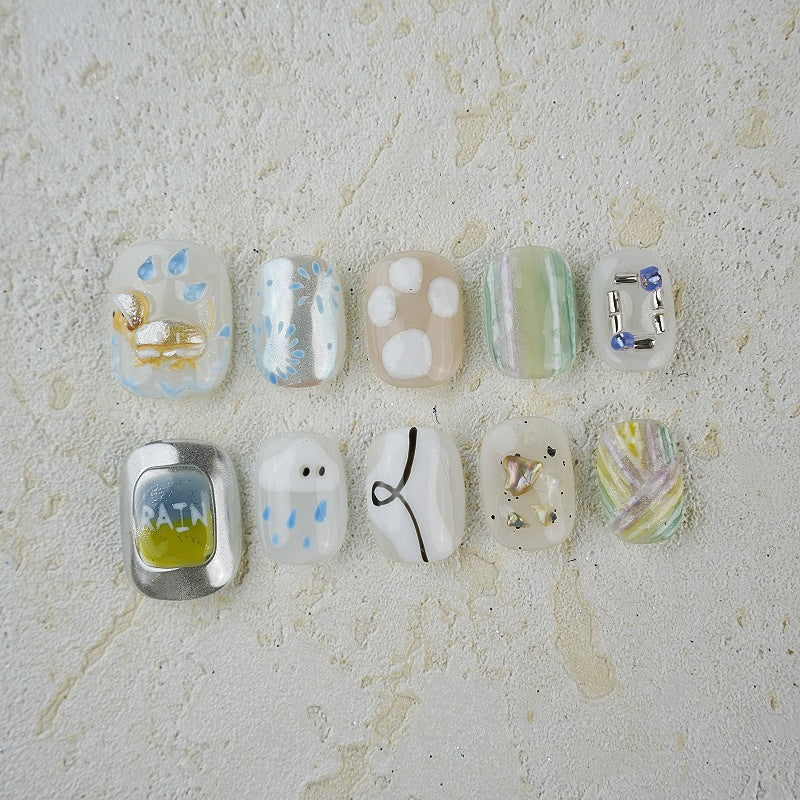 Portez un joli dessin animé pincé court fini nail art