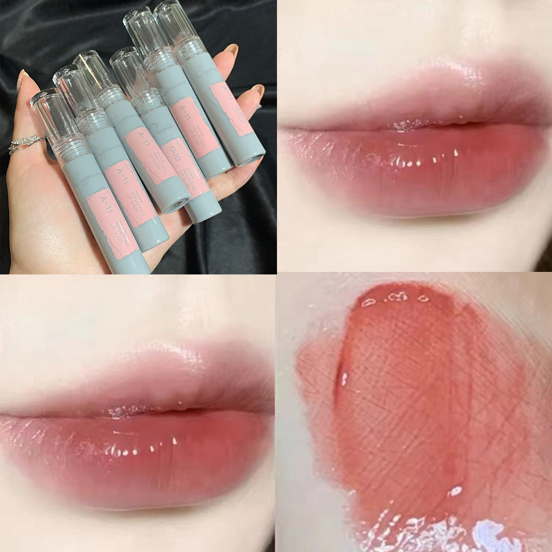 Gloss à lèvres en tube gris laqué effet miroir à l'eau légère et gelée