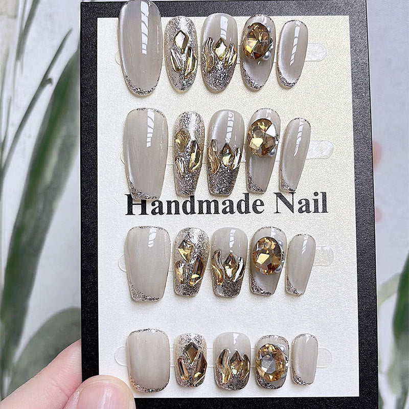 Faux ongles en diamant champagne faits à la main