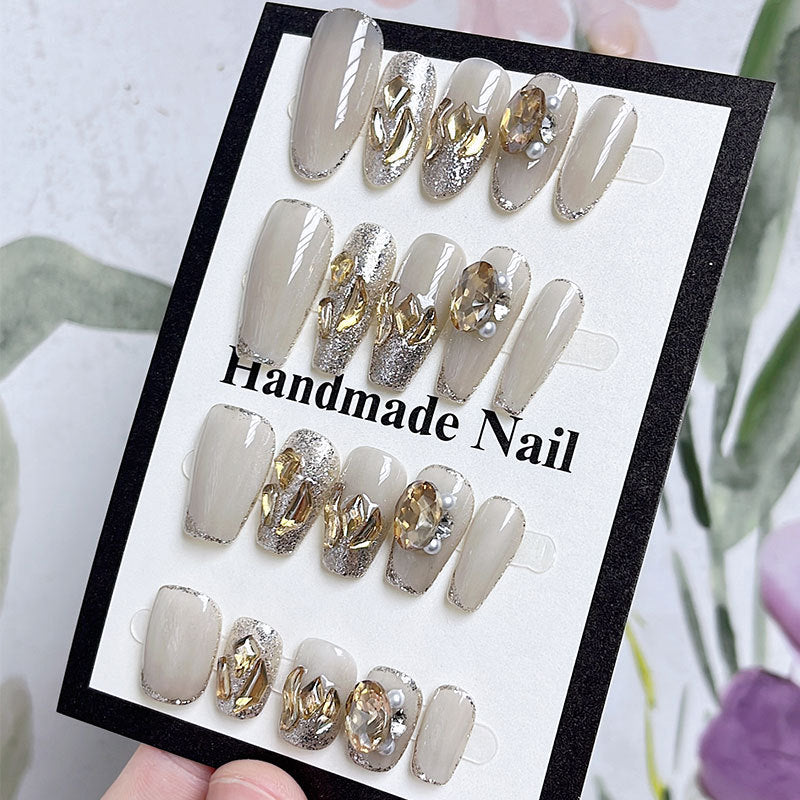 Faux ongles en diamant champagne faits à la main